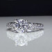 Shared Prong Antique Style Engagement Ring with Large Graduated Diamonds Laying Down